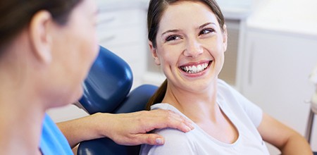 Dentist using pen to point at dental X-ray