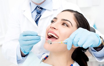 Woman getting a dental cleaning